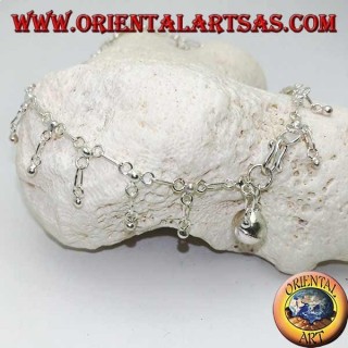 Silver anklet with hanging balls and a bell