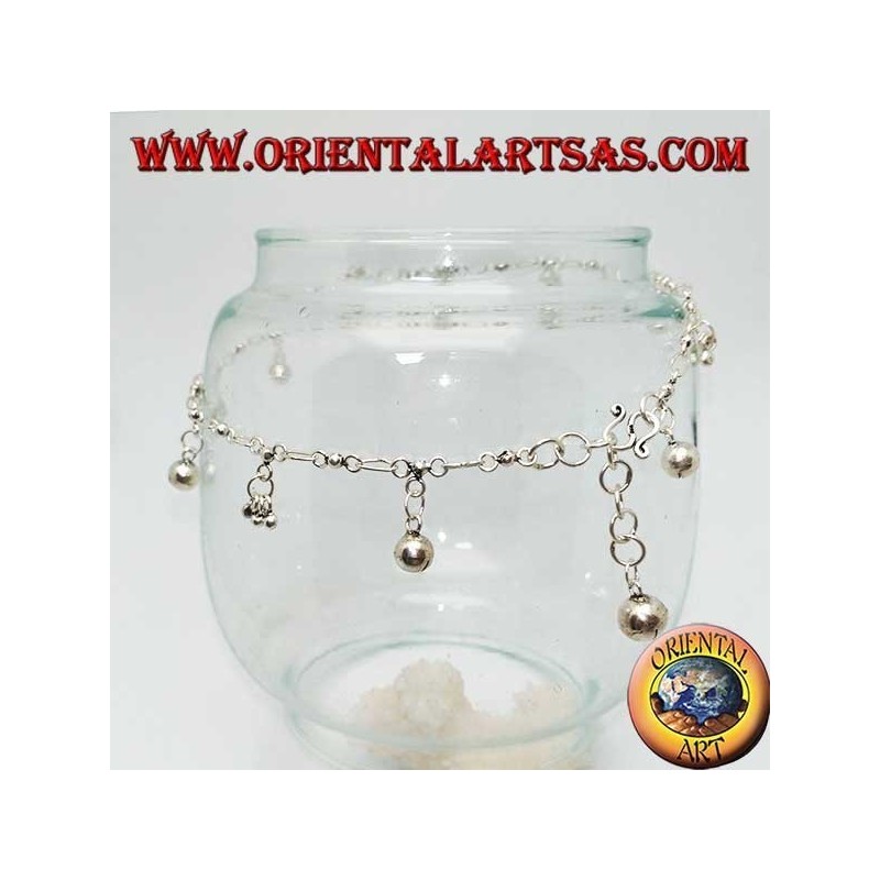 Silver anklet with groups of three balls and alternating hanging bells