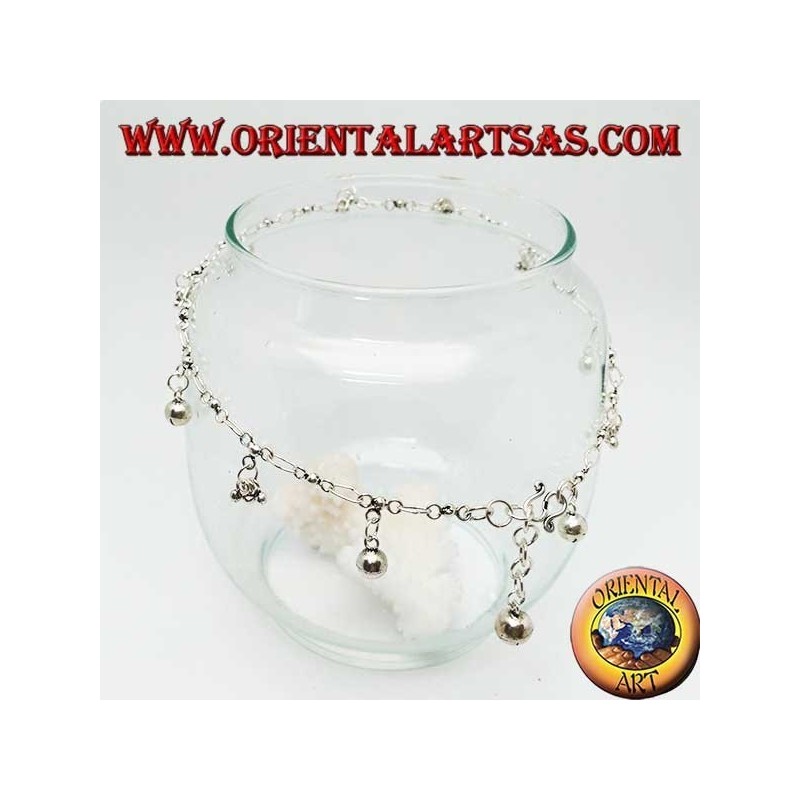 Silver anklet with groups of three balls and alternating hanging bells