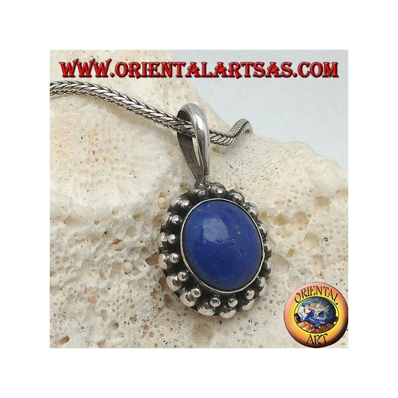 Silver pendant with oval lapis lazuli surrounded by two rounds of spheres...