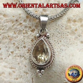 Colgante de plata con topacio amarillo natural rodeado de entrelazados y bolas.