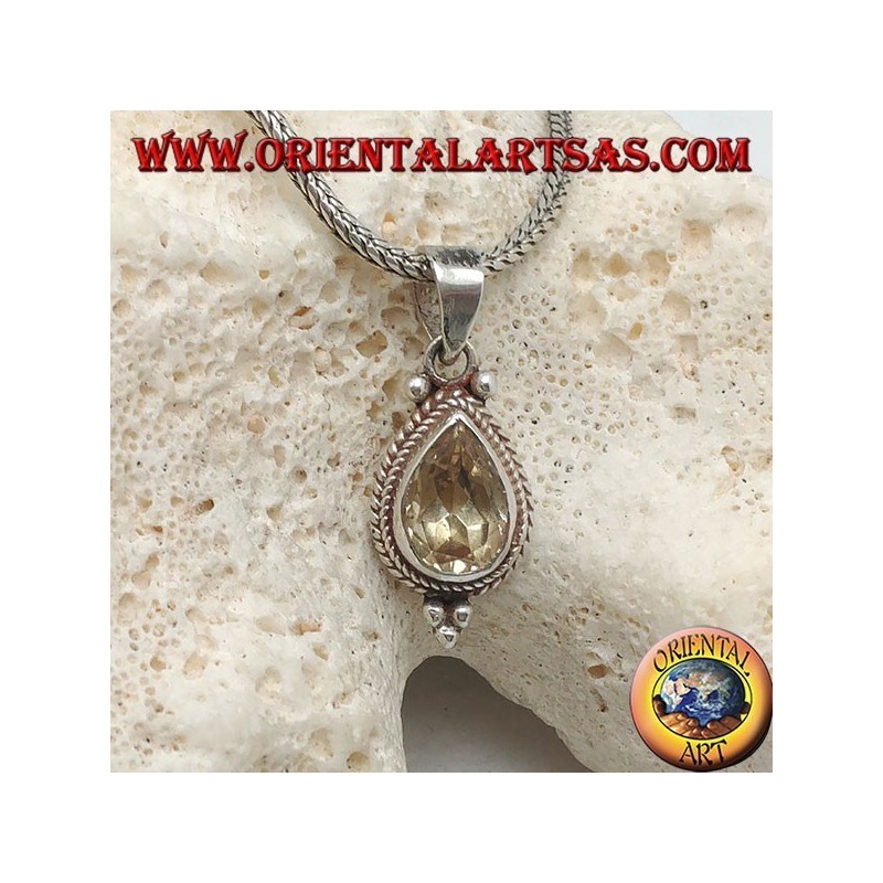 Silver pendant with natural yellow drop topaz surrounded by intertwining and balls