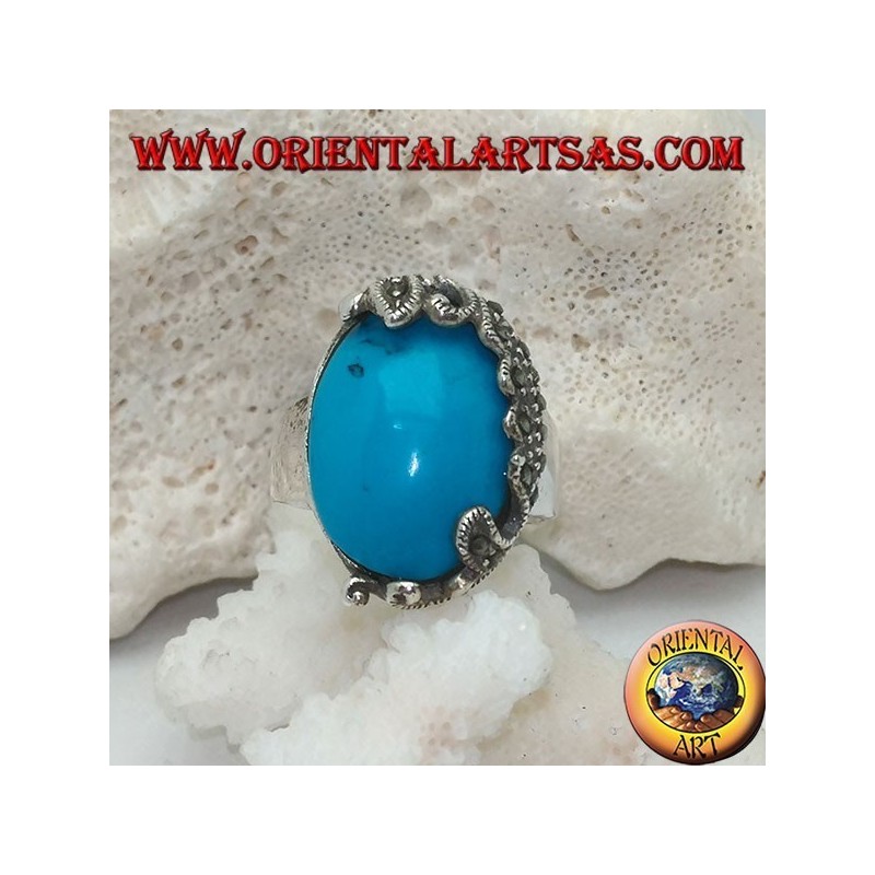 Silver ring with oval cabochon turquoise and decorations with floral marcasites on one side only