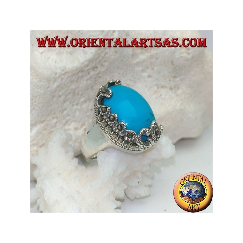 Silver ring with oval cabochon turquoise and decorations with floral marcasites on one side only