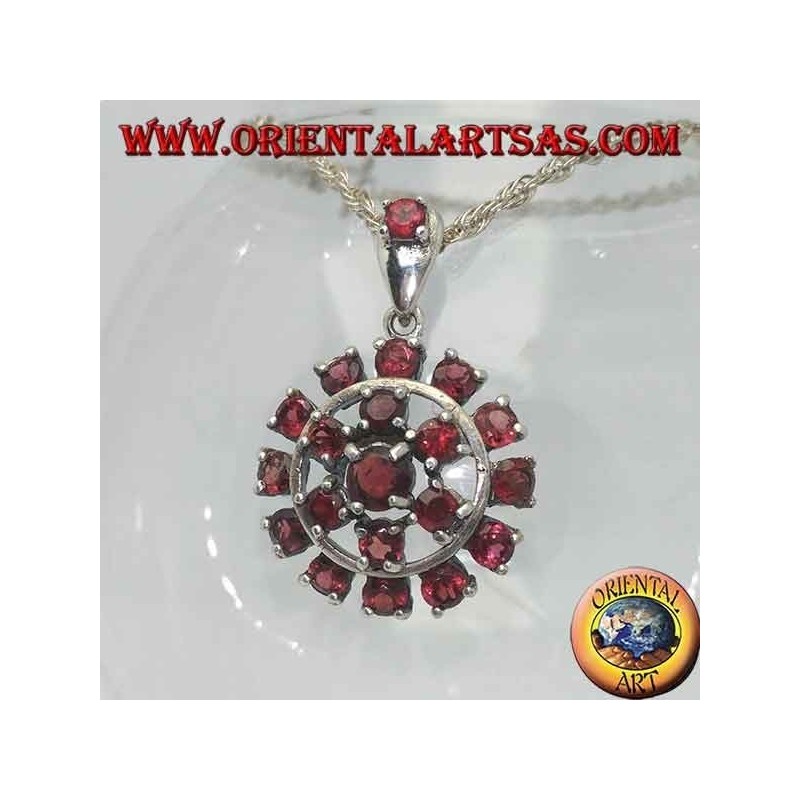 Round garnet silver pendant surrounded by a six-pointed star and a circle of garnets