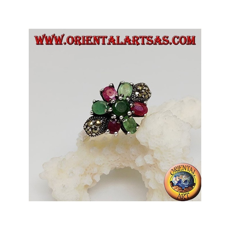 Silver hexagonal flower ring with emeralds and round natural rubies set and narcassite on the sides