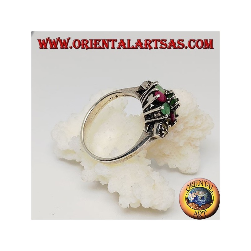 Silver hexagonal flower ring with emeralds and round natural rubies set and narcassite on the sides