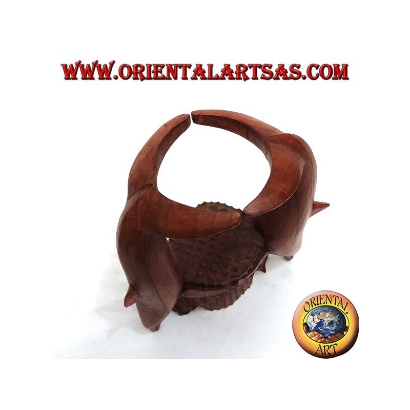 Bottle holder with sculpture of two dolphins in Suar wood acrobatics