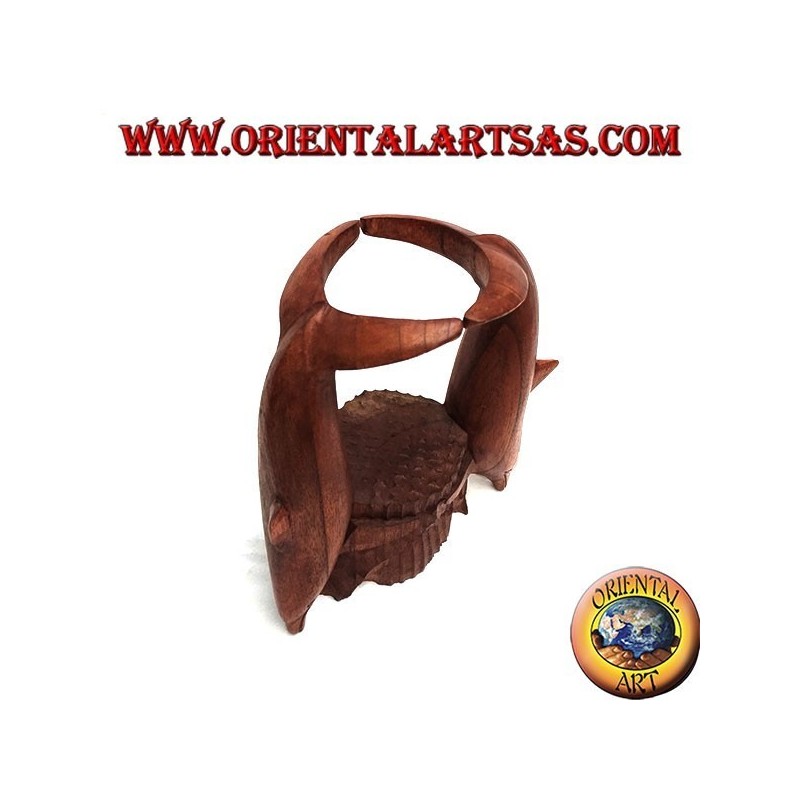 Bottle holder with sculpture of two dolphins in Suar wood acrobatics