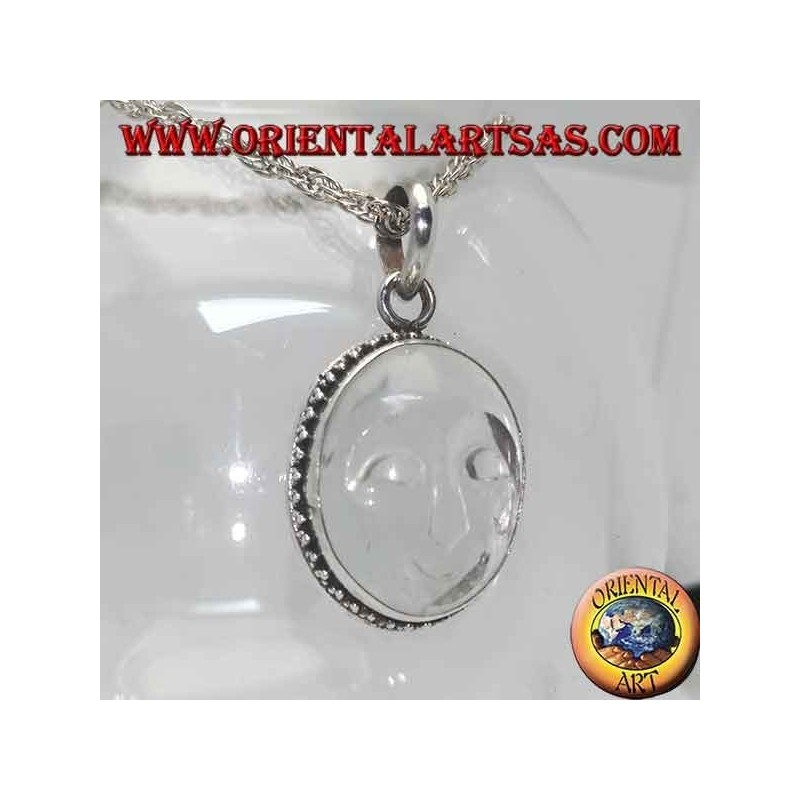 Silver pendant with sun hollowed out of rock crystal and border decorated with dots