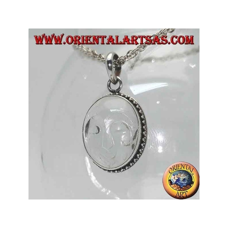 Pendentif en argent avec soleil évidé en cristal de roche et bordure ornée de points