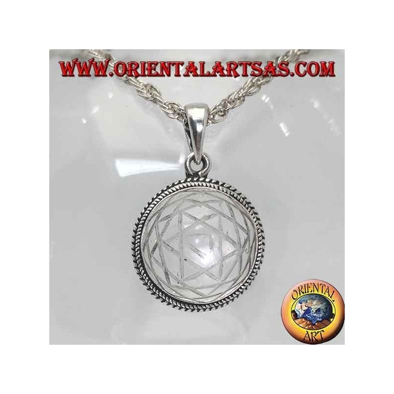 Silver pendant with Sri Yantra engraved in the round rock crystal and intertwined edge