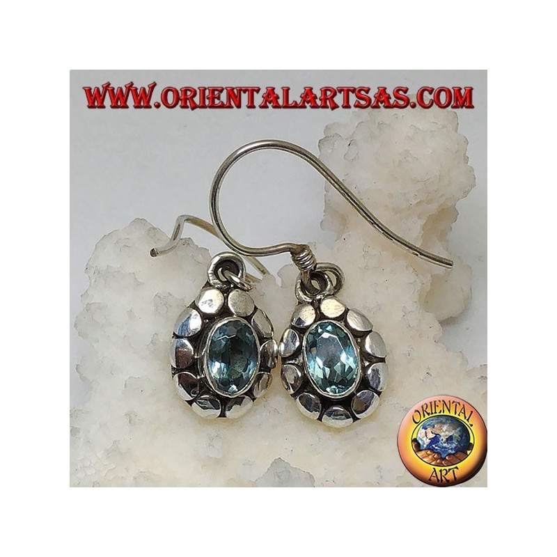 Silver earrings with natural oval blue topaz surrounded by discs