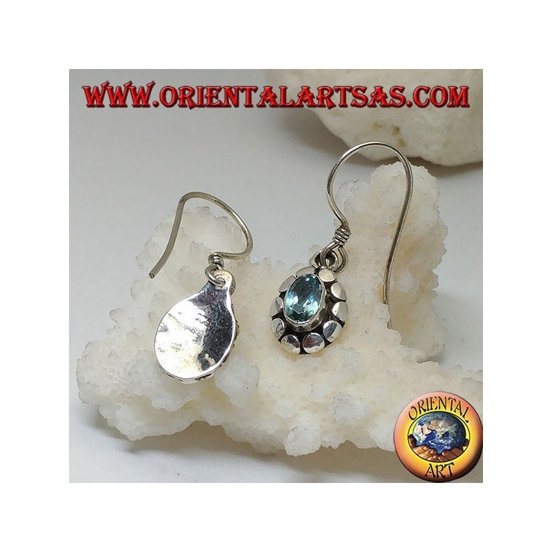 Silver earrings with natural oval blue topaz surrounded by discs