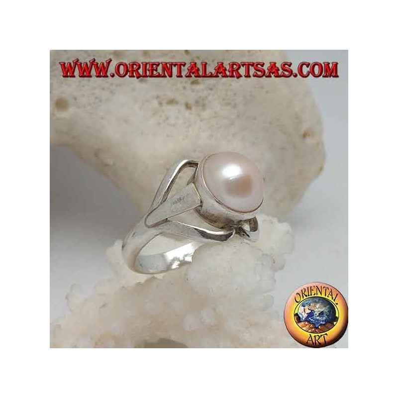 Silver ring with natural pearl in the center between lip lines