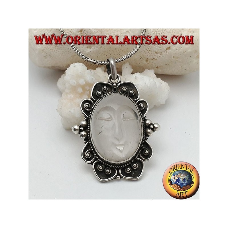 Silver pendant with sun set on oval rock crystal and decorated border