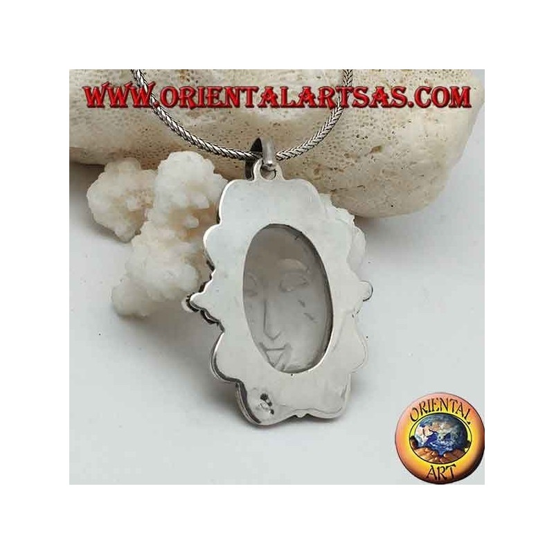 Silver pendant with sun set on oval rock crystal and decorated border