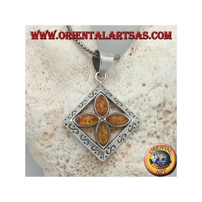 Silver cross pendant of 4 natural shuttle ambers in an engraved square