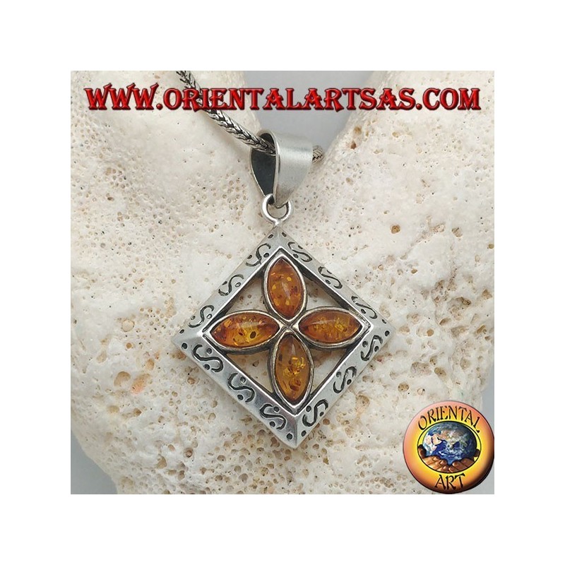 Silver cross pendant of 4 natural shuttle ambers in an engraved square