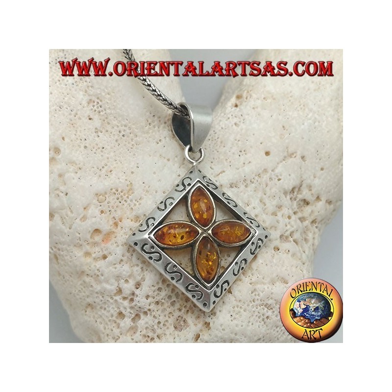 Silver cross pendant of 4 natural shuttle ambers in an engraved square
