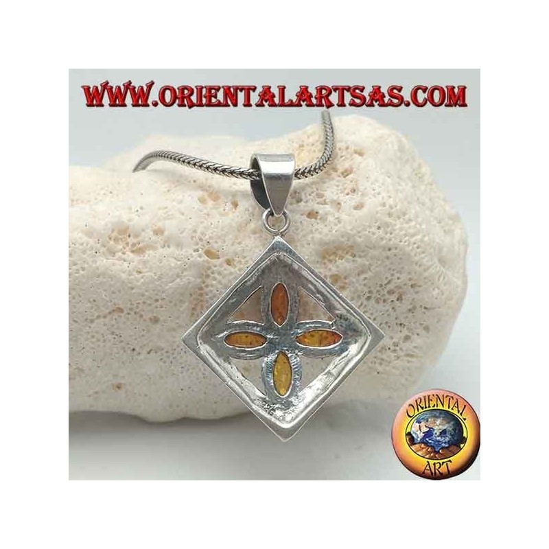 Silver cross pendant of 4 natural shuttle ambers in an engraved square