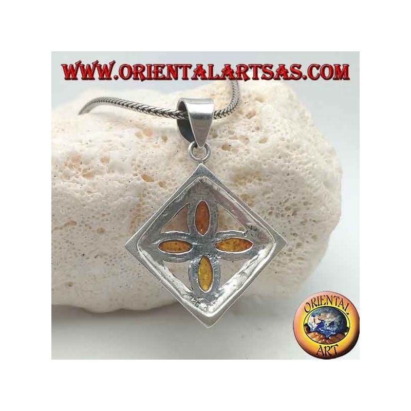 Silver cross pendant of 4 natural shuttle ambers in an engraved square
