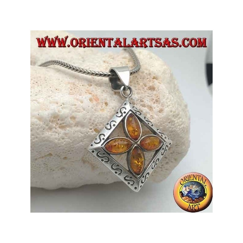 Silver cross pendant of 4 natural shuttle ambers in an engraved square