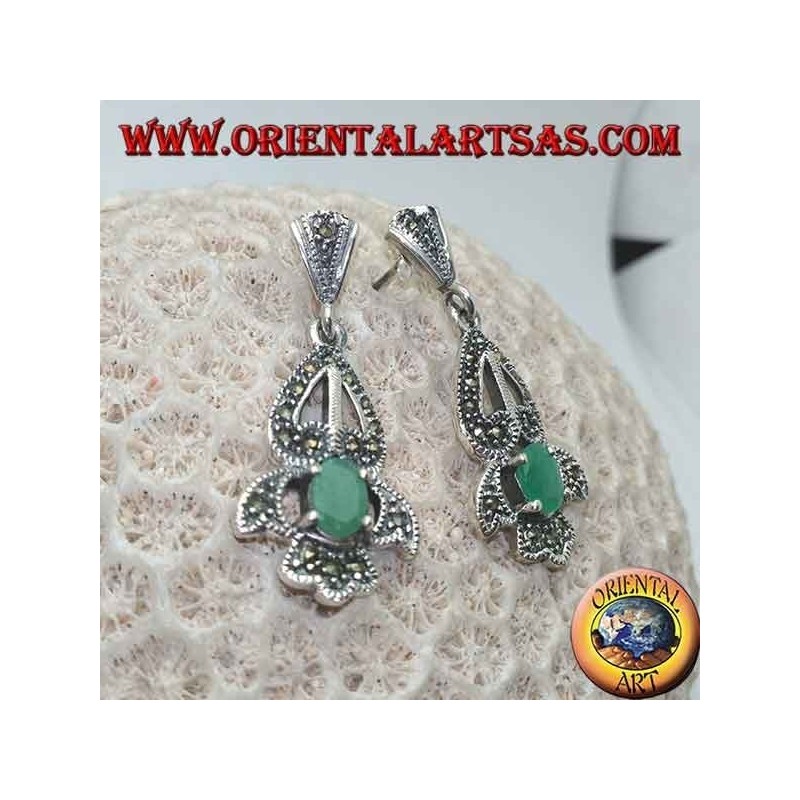 Silver earrings with natural oval emerald set on an elegant openwork frame studded with marcasite
