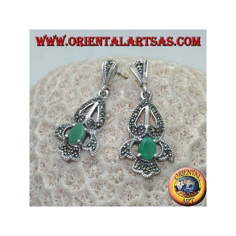 Silver earrings with natural oval emerald set on an elegant openwork frame studded with marcasite