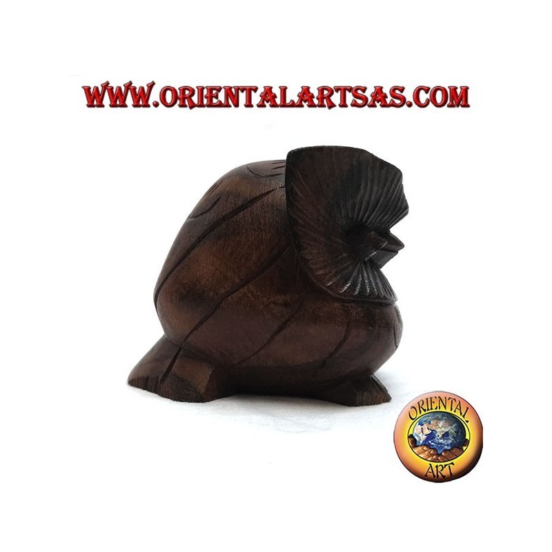 Escultura de un búho acurrucado en madera de ébano de 7 cm.