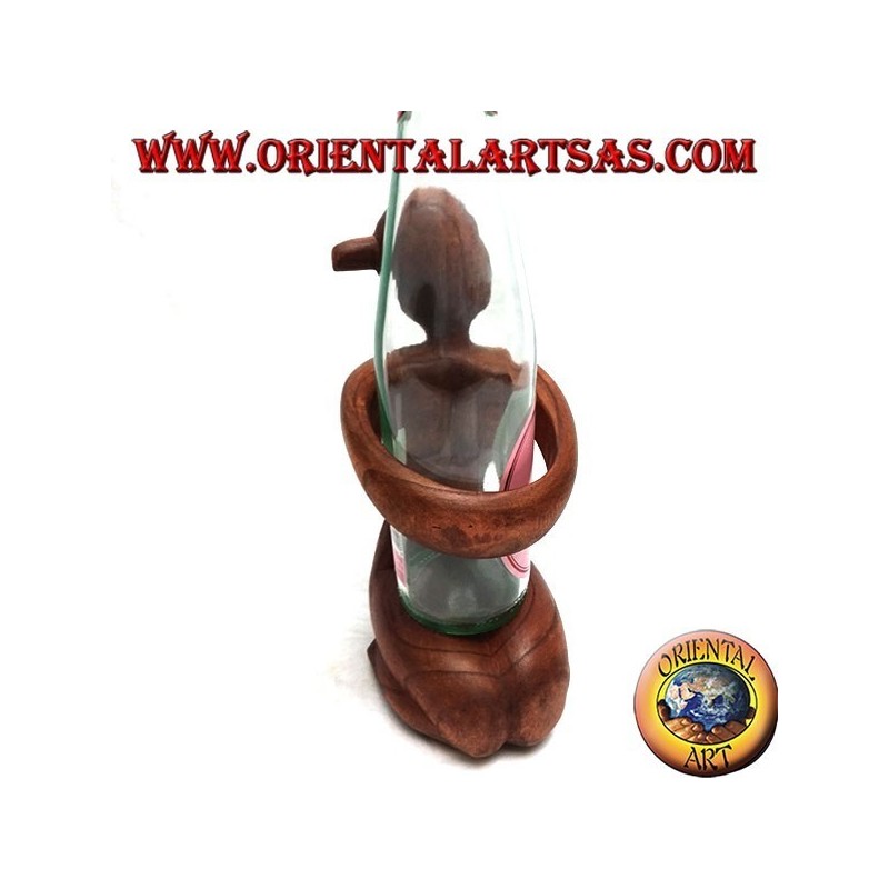 Bottle holder sculpture of a kneeling woman embracing in Suar wood