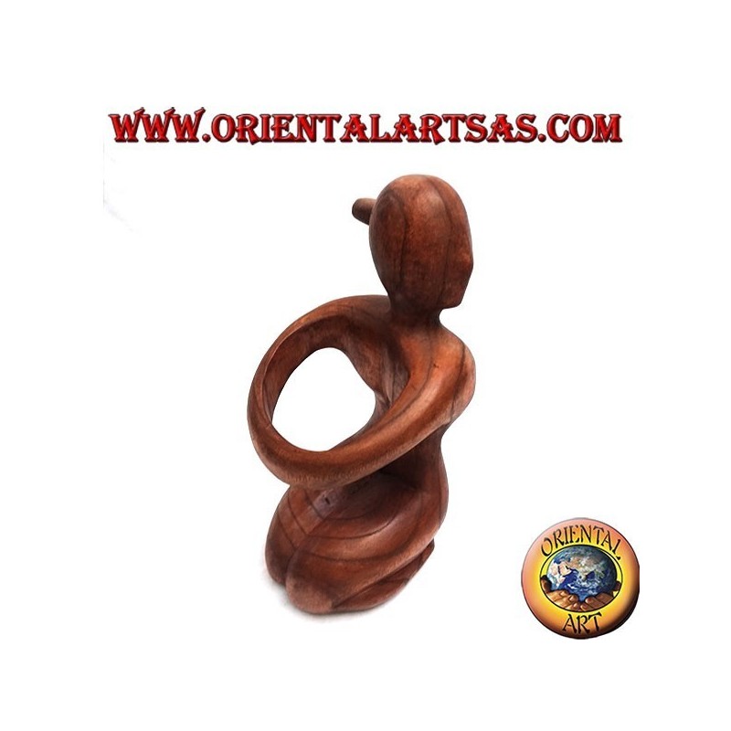 Bottle holder sculpture of a kneeling woman embracing in Suar wood