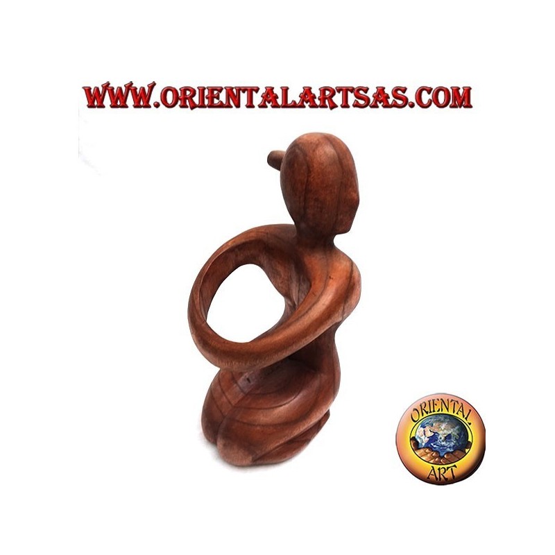 Bottle holder sculpture of a kneeling woman embracing in Suar wood