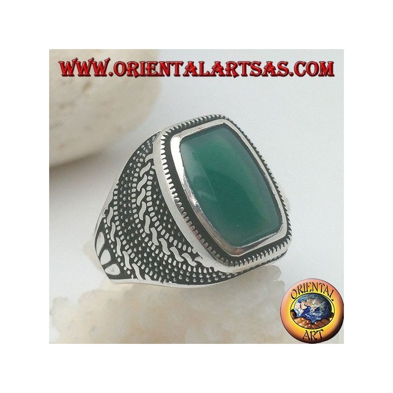 Silver ring with a rectangular green agate rounded in a rosette of balls and weaves