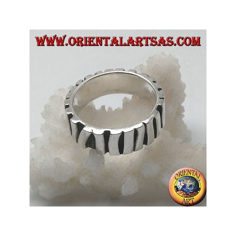 Silver band ring with a row of sticks placed parallel