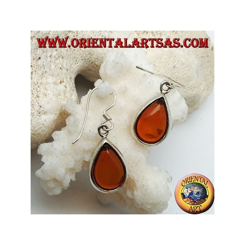 Boucles d'oreilles en argent avec ambre goutte naturelle sur un sertissage lisse