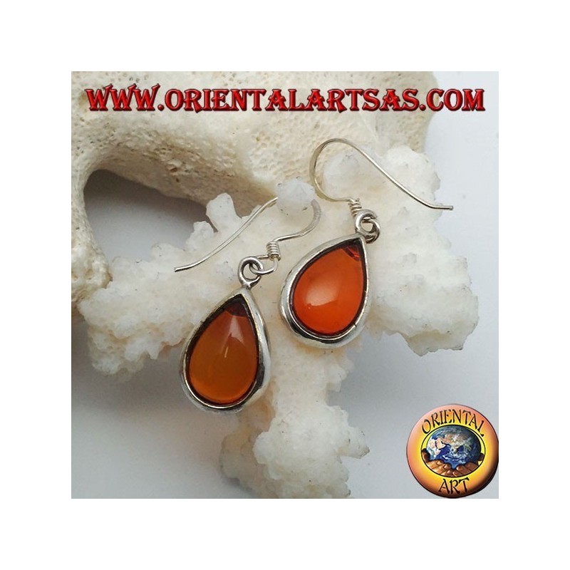 Silver earrings with natural drop amber on a smooth setting