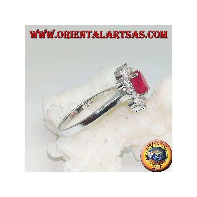 Silver flower ring with synthetic round ruby with embedded white zircon petals