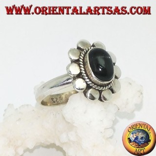 Anillo de flores de plata con cabujón oval estrella negra rodeada de trenzas y disquetes