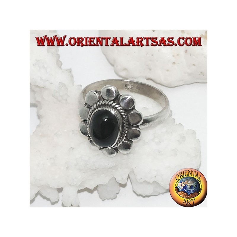 Silver flower ring with oval cabochon black star surrounded by plaiting and diskettes