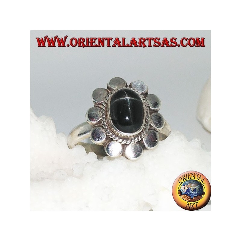 Anillo de flores de plata con cabujón oval estrella negra rodeada de trenzas y disquetes