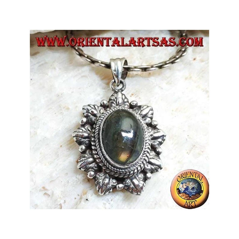 Silver pendant with oval cabochon labradorite surrounded by braid and leaf and alternating ball