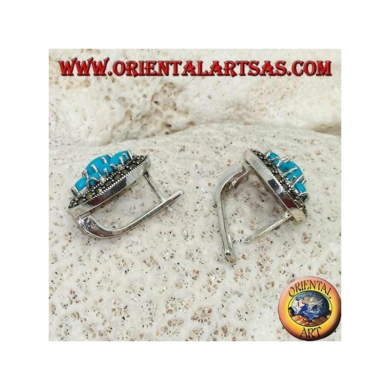 Boucles d'oreilles fleur turquoise en argent serties dans un cercle de marcassite avec fermeture bloc