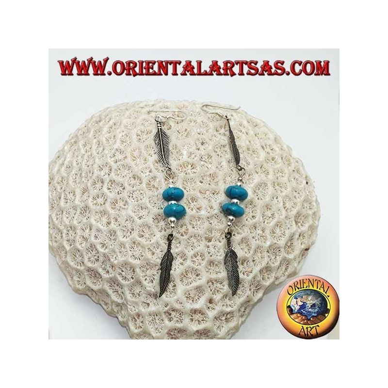 Boucles d'oreilles pendantes en argent avec disques turquoise et boules entre deux plumes