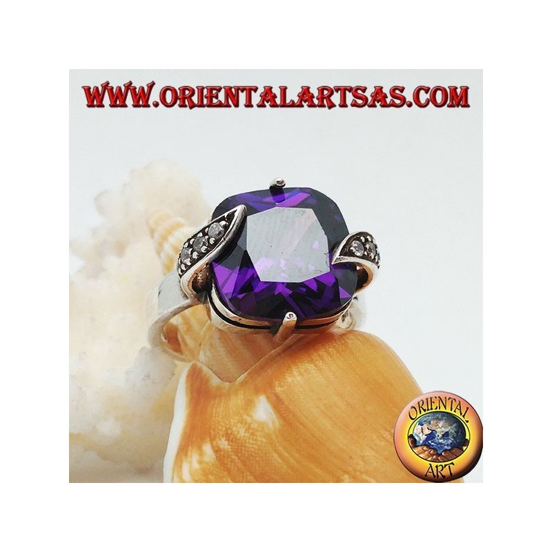 Silver ring with amethyst-colored square zircon set between marcasite leaves