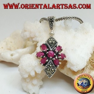 Silver pendant with a round ruby in a star of natural oval rubies and two marcasite rhombuses