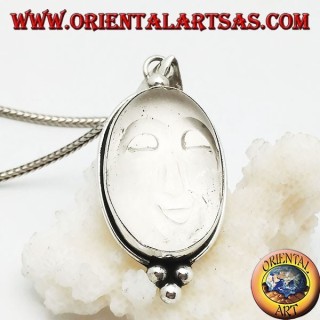 Silver pendant with sun sun set on an oval rock crystal and three balls below