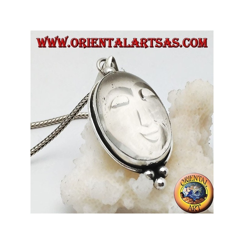 Pendentif en argent avec soleil creusé sur un cristal de roche ovale et trois boules en dessous