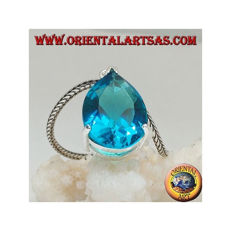 Silver pendant with a faceted blue topaz set