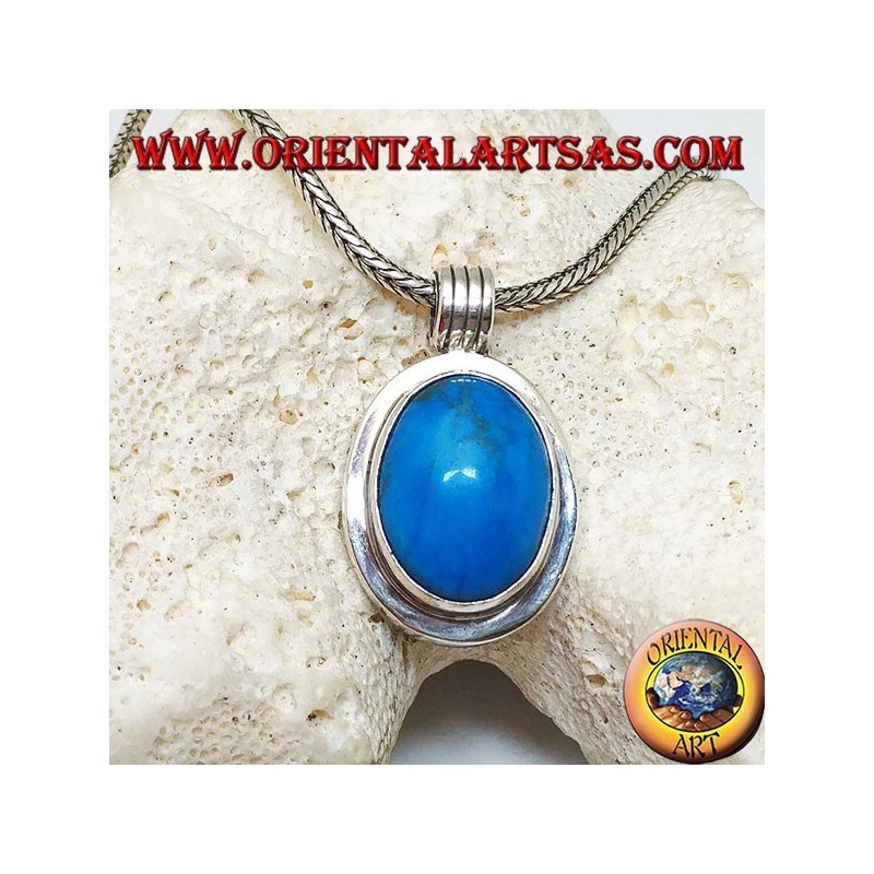 Silver pendant with oval turquoise cabochon on a thick smooth frame and a striped hook